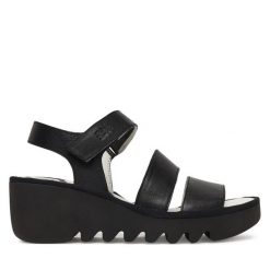 Sandały Fly London. Czarne sandały damskie Fly London, bez wzorów, bez obcasa, na koturnie, bez zapięcia. Za 547.99 zł.