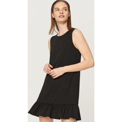 Sukienka z falbanką - Czarny. Sukienki damskie Reserved. Za 139.99 zł.