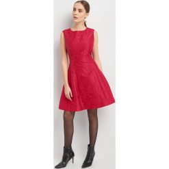 Żakardowa sukienka. Sukienki damskie marki Orsay. Za 179.99 zł.