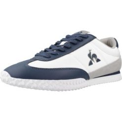 Kapcie LE COQ SPORTIF VELOCE Biały. Białe kapcie damskie le coq sportif, bez wzorów, ze skóry. Za 300.55 zł.