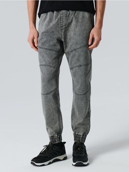 Jeansy jogger z efektem sprania - szary. Szare jeansy męskie Sinsay. Za 59.99 zł.