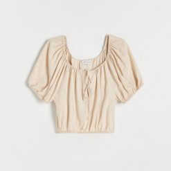 Bluzka z odkrytymi ramionami - beżowy. Brązowe bluzki damskie Reserved, l, bez wzorów, z tkaniny, bez kołnierzyka, bez ramiączek. W wyprzedaży za 29.99 zł.