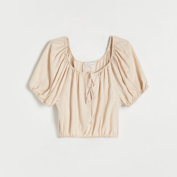 Bluzka z odkrytymi ramionami - beżowy. Brązowe bluzki damskie Reserved, l, bez wzorów, z tkaniny, bez kołnierzyka, bez ramiączek. W wyprzedaży za 29.99 zł.