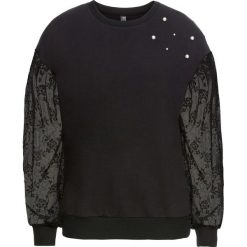 Bluza z koronkowymi rękawami bonprix czarny. Bluzy damskie marki KALENJI. Za 49.99 zł.