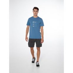 Koszulka męska Protest PRTARMANN. Niebieskie koszulki sportowe męskie Protest, m, bez wzorów, bez kołnierzyka, bez ramiączek, trekkingowe. Za 83.30 zł.