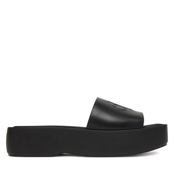 Klapki Calvin Klein. Czarne klapki damskie Calvin Klein, bez wzorów, bez obcasa. Za 250.99 zł.