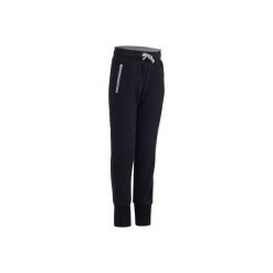 Spodnie Gym 520. Czarne spodnie materiałowe dla chłopców DOMYOS. W wyprzedaży za 34.99 zł.