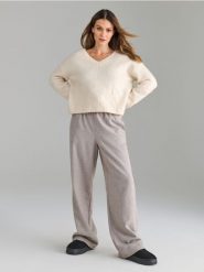Spodnie wide leg - beżowy. Brązowe spodnie materiałowe damskie Sinsay, l, bez wzorów. Za 59.99 zł.