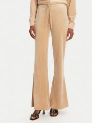 Juicy Couture Spodnie dresowe Christine JCWBJ125304 Beżowy Flared Leg. Brązowe spodnie dresowe damskie Juicy Couture, xs, bez wzorów, z dresówki. Za 269.99 zł.