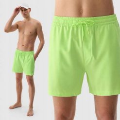 SPODENKI MĘSKIE 4F SPORTOWE PLAŻOWE KĄPIELOWE PRZED KOLANO KOLOR ZIELONY. Zielone kąpielówki męskie 4f, l, bez wzorów, z materiału, krótkie, do biegania. Za 79.99 zł.