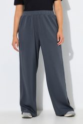 Damskie Spodnie dresowe rozcięcia po bokach szerokie nogawki elastyczny pas. Szare spodnie dresowe damskie Ulla Popken, plus size, bez wzorów, z dresówki. Za 279.99 zł.