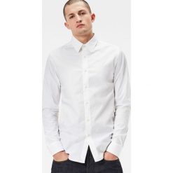 G-Star Raw - Koszula. Szare koszule męskie G-Star Raw, z bawełny, z klasycznym kołnierzykiem, z długim rękawem. W wyprzedaży za 249.90 zł.