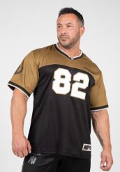 Trenton Koszulka piłkarska - Czarny/Złoty. Żółte koszulki sportowe męskie GORILLA WEAR, xl, bez wzorów, z jersey, bez kołnierzyka, bez ramiączek, na fitness i siłownię. Za 209.00 zł.