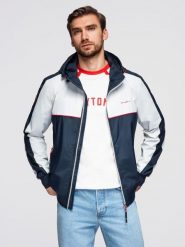 Męska kontrastowa kurtka wiatrówka z kapturem - granatowo-biała V1. Białe kurtki męskie Ombre Clothing, m, z aplikacjami, z gumy, eleganckie, z kapturem. Za 299.99 zł.