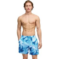 Szorty męskie Puma Swim Men Printed Rasterized Mid Short. Niebieskie szorty męskie Puma, m, bez wzorów, z materiału. Za 290.00 zł.