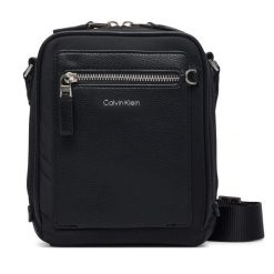 Saszetka Calvin Klein. Czarne saszetki męskie Calvin Klein, młodzieżowe, małe. Za 329.99 zł.