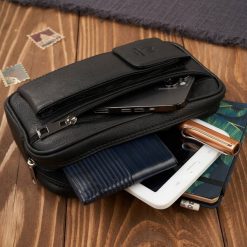 Paolo Peruzzi Saszetka męska skórzana do ręki z miejscem na telefon czarna T-132-BL. Czarne saszetki męskie Paolo Peruzzi. Za 178.31 zł.