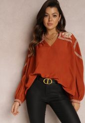 Pomarańczowa Bluzka z Bufiastym Rękawem i Kwiatowym Haftem Oluze. Brązowe bluzki damskie Renee, l, bez wzorów, z jeansu, eleganckie, bez kołnierzyka, bez ramiączek. Za 129.99 zł.