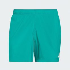 SZORTY DO PŁYWANIA Z NOGAWKAMI O DŁUGOŚCI 12,5 CM. Zielone szorty męskie Adidas, l, bez wzorów, z materiału, klasyczne. Za 119.00 zł.
