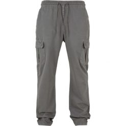 Bawełniane spodnie cargo Urban Classics. Czarne spodnie materiałowe męskie Urban Classics, m, bez wzorów, z bawełny. Za 204.40 zł.