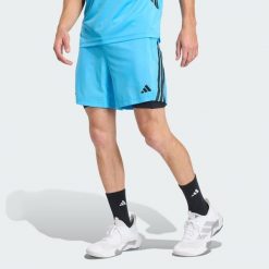 Szorty TECH ESSENTIALS WORKOUT 2 w 1. Niebieskie buty sportowe męskie Adidas, bez zapięcia, na fitness i siłownię, climacool (adidas). Za 239.00 zł.