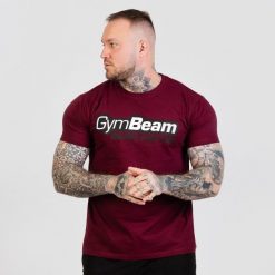 Koszulka męska fitness regular bordowa Beam. Czerwone koszulki sportowe męskie GYMBEAM, l, bez wzorów, z bawełny, bez kołnierzyka, bez ramiączek, na fitness i siłownię. Za 54.90 zł.