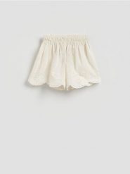 Szorty plażowe z bawełny - złamana biel. Szorty damskie Reserved, l, bez wzorów, z bawełny. Za 79.99 zł.