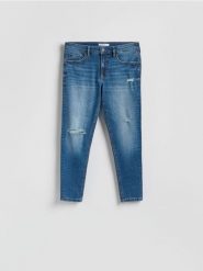 Jeansy skinny z przetrciami - niebieski. Niebieskie jeansy męskie Reserved. Za 129.99 zł.