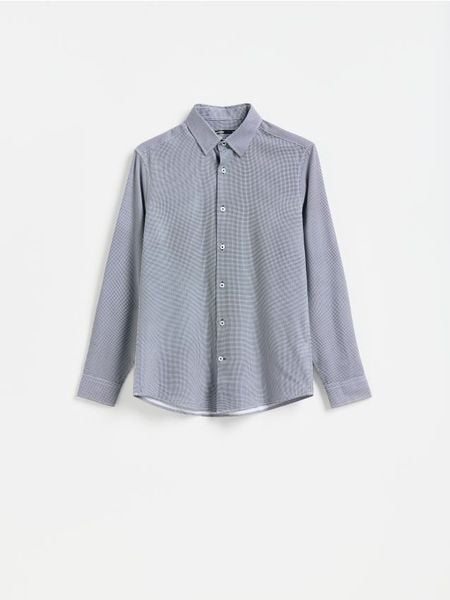 Koszula slim z drobnym printem - czarny. Czarne koszule męskie Reserved, l, bez wzorów, z tkaniny, bez kołnierzyka, bez ramiączek. Za 129.99 zł.