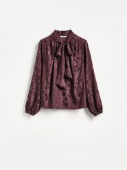 Wzorzysta bluzka - ciemnobrązowy. Brązowe bluzki damskie Reserved, l, bez wzorów, z tkaniny, bez kołnierzyka, bez ramiączek. Za 109.99 zł.