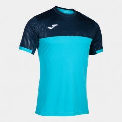 Koszulka do tenisa męska Joma Montreal. Niebieskie koszulki sportowe męskie Joma, m, bez wzorów, bez kołnierzyka, bez ramiączek, do piłki nożnej. Za 145.99 zł.