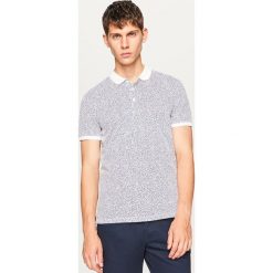 Koszulka polo z mikroprintem - Biały. Białe koszulki polo męskie Reserved. W wyprzedaży za 49.99 zł.