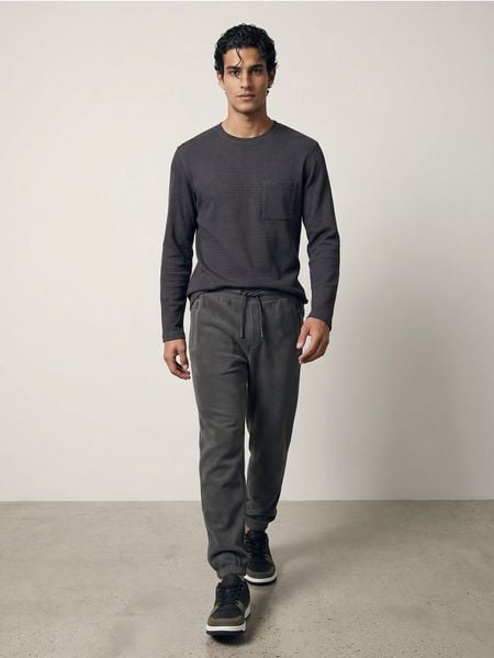 Spodnie polarowe jogger - szary. Szare spodnie sportowe męskie Sinsay, l, bez wzorów, z polaru, na fitness i siłownię. Za 59.99 zł.