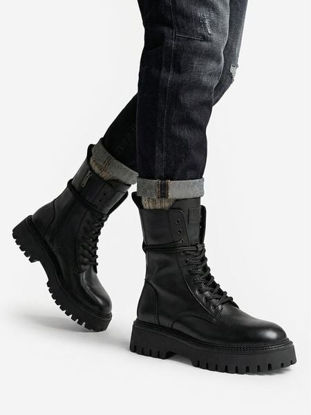 G-Star Raw Trzewiki EO-GEDIZ-8090-25 Czarny. Czarne botki damskie G-Star, ze skóry, retro, bez obcasa, na płaskiej podeszwie, bez zapięcia. Za 479.99 zł.