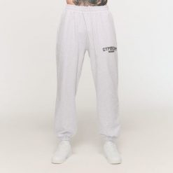 Spodnie męskie fitness oversize ze sznurkiem Varsity szare. Szare spodnie sportowe męskie GYMBEAM, m, bez wzorów, z bawełny, na fitness i siłownię. Za 126.90 zł.