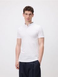 Koszulka polo regular z bawełny - biały. Białe koszulki polo męskie Reserved, l, bez wzorów, z bawełny, bez ramiączek. Za 69.99 zł.