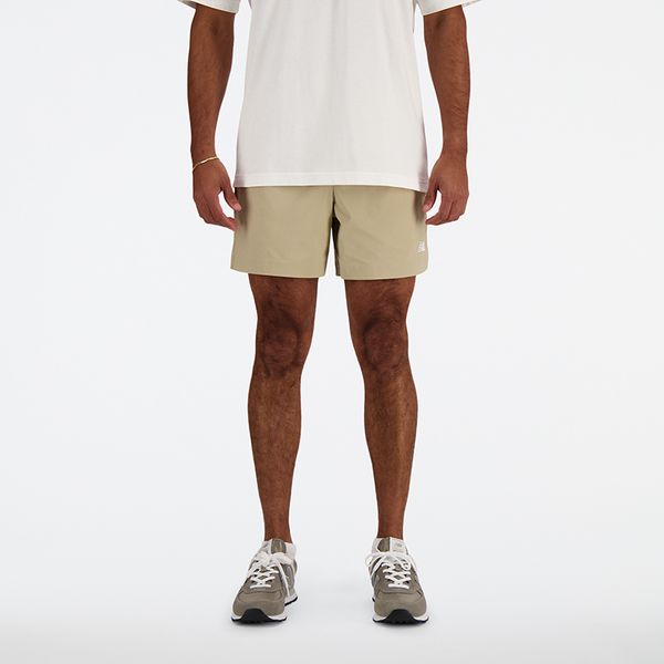 Spodenki męskie New Balance MS41517SOT – beżowe. Brązowe szorty męskie New Balance, m, bez wzorów, z materiału, klasyczne. Za 199.99 zł.