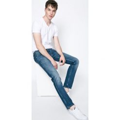 Wrangler - Jeansy. Niebieskie jeansy męskie Wrangler. W wyprzedaży za 279.90 zł.