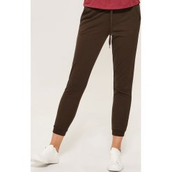 Dresowe joggery - Khaki. Brązowe spodnie dresowe damskie House, z dresówki. Za 59.99 zł.