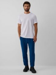 4F Spodnie dresowe z technicznej dzianiny męskie - turkusowe L. Niebieskie spodnie sportowe męskie 4f, l, bez wzorów, z dresówki. Za 189.99 zł.
