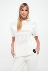 Sweter damski z krótkim rękawem ARMANI EXCHANGE. Swetry damskie Armani Exchange, m, bez wzorów, bez kołnierzyka, bez ramiączek, krótkie, bez kaptura. Za 609.00 zł.