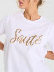 Bawełniana koszulka z połyskującymi aplikacjami - biały. Białe t-shirty damskie Sinsay, l, z aplikacjami, z bawełny, bez kołnierzyka. Za 29.99 zł.