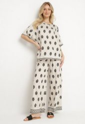 Jasnobeżowy Komplet Wiskozowy w Boho Print Bluzka z Krótkim Rękawem i Szerokie Spodnie Natilene. Brązowe bluzki damskie Born2be, l, bez wzorów, z materiału, boho, bez kołnierzyka, bez ramiączek. Za 84.99 zł.