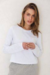 BLUZKA PENNY BIAŁA M - Flawless. Białe bluzki damskie Flawless, m, bez wzorów, z bawełny, klasyczne, bez kołnierzyka, bez ramiączek. Za 189.00 zł.