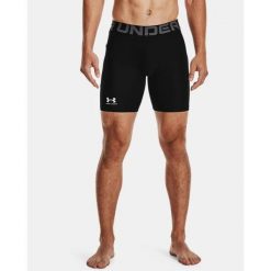 Spodenki męskie Under Armour HG Armour. Czarne krótkie spodenki sportowe męskie Under Armour, l, bez wzorów, z poliesteru, do piłki nożnej. Za 104.99 zł.
