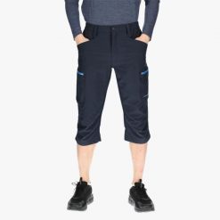 Spodnie outdoor turystyka męskie Swedemount Glittertind 3/4 Pants szybkoschnące. Niebieskie spodnie sportowe męskie SWEDEMOUNT, na lato, m, bez wzorów, z tkaniny, outdoorowe. Za 249.99 zł.