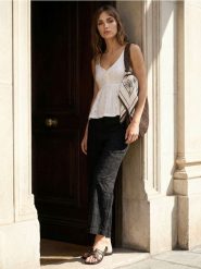 Ażurowe spodnie straight leg - czarny. Czarne spodnie materiałowe damskie Sinsay, l, w ażurowe wzory. Za 59.99 zł.