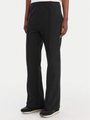 Calvin Klein Jeans Spodnie dresowe Archive Logo LV047B240G Czarny Regular Fit. Czarne jeansy damskie Calvin Klein Jeans, l, bez wzorów, z bawełny. Za 369.99 zł.