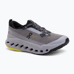Buty do biegania damskie On Cloudsurfer Trail 2. Szare obuwie sportowe damskie On, bez wzorów, z materiału, do biegania. Za 759.99 zł.