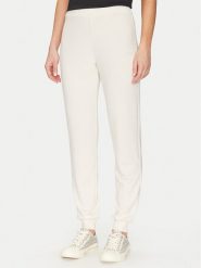 Guess Spodnie materiałowe O5GB05 KCQP2 Granatowy Regular Fit. Niebieskie spodnie materiałowe damskie Guess, xl, z aplikacjami, z materiału. Za 109.99 zł.